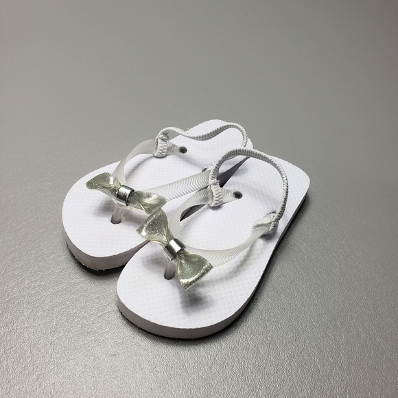 3/$15 toddler girls Island club whitebow flip flops size 10 - Picture 1 of 6